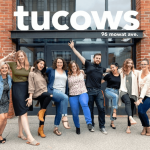 Members of the Tucows team outside of their office