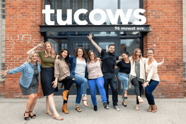 Members of the Tucows team outside of their office