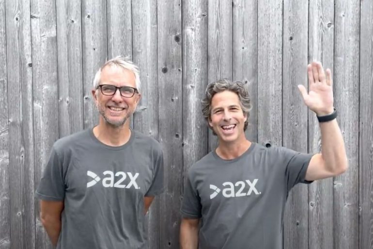 Hubdoc founders wearing A2X shirts in grey