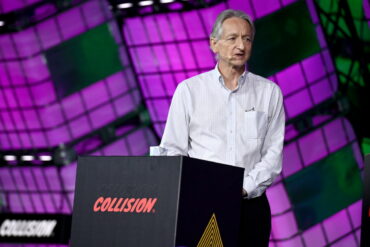 Geoffrey Hinton. AI expert, on stage speaking at Collision conference