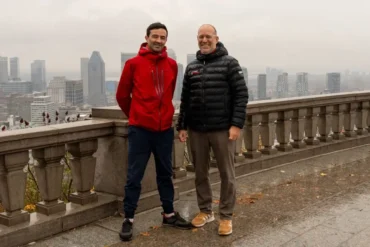 Bloomsco's founders stand together on a bridge.