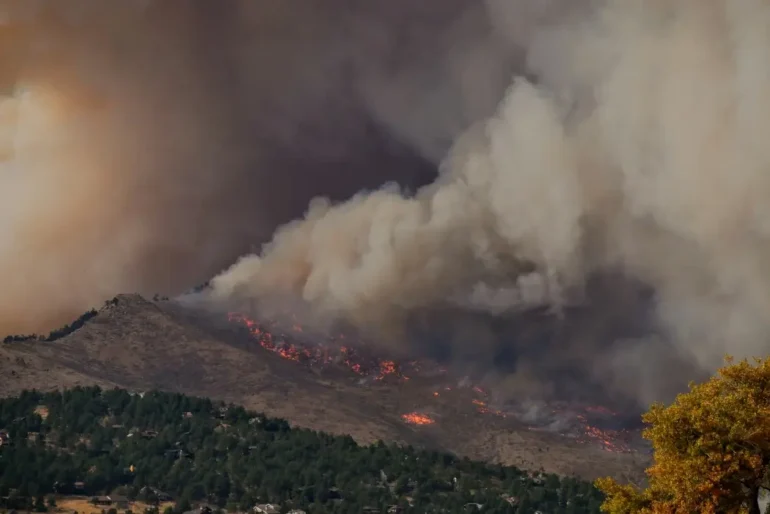 Wildfire smoke blankets the sky.