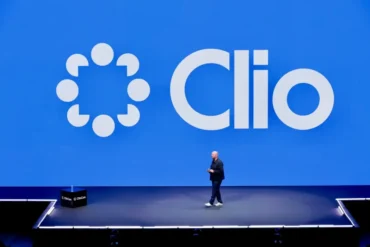 A stage with a large Clio logo in the background